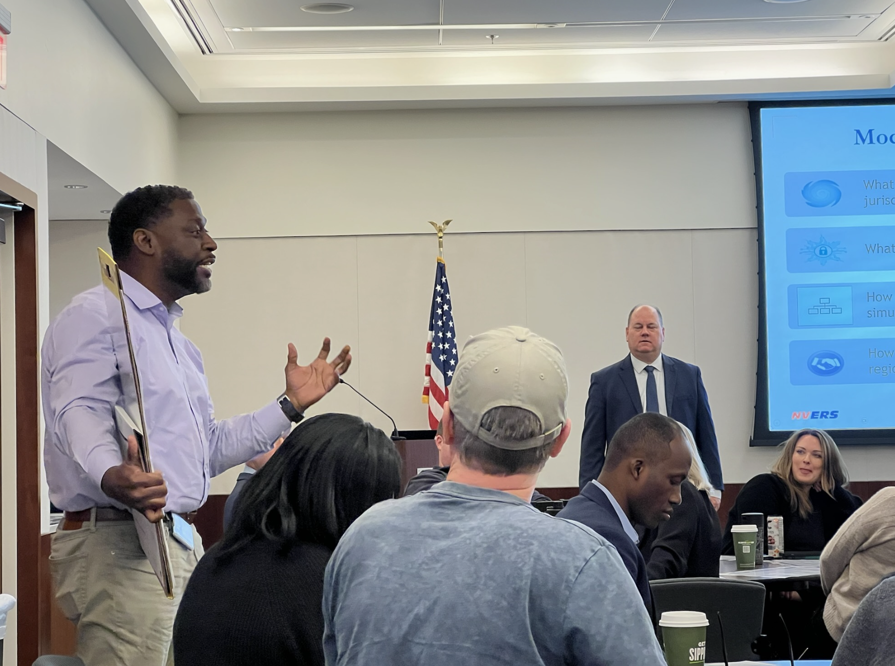 Exercise participants engaged in discussion during the TTX. 